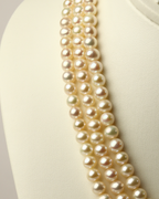 Timeless Three-Row Genuine Freshwater Pearl Necklace (17-inch Draped)